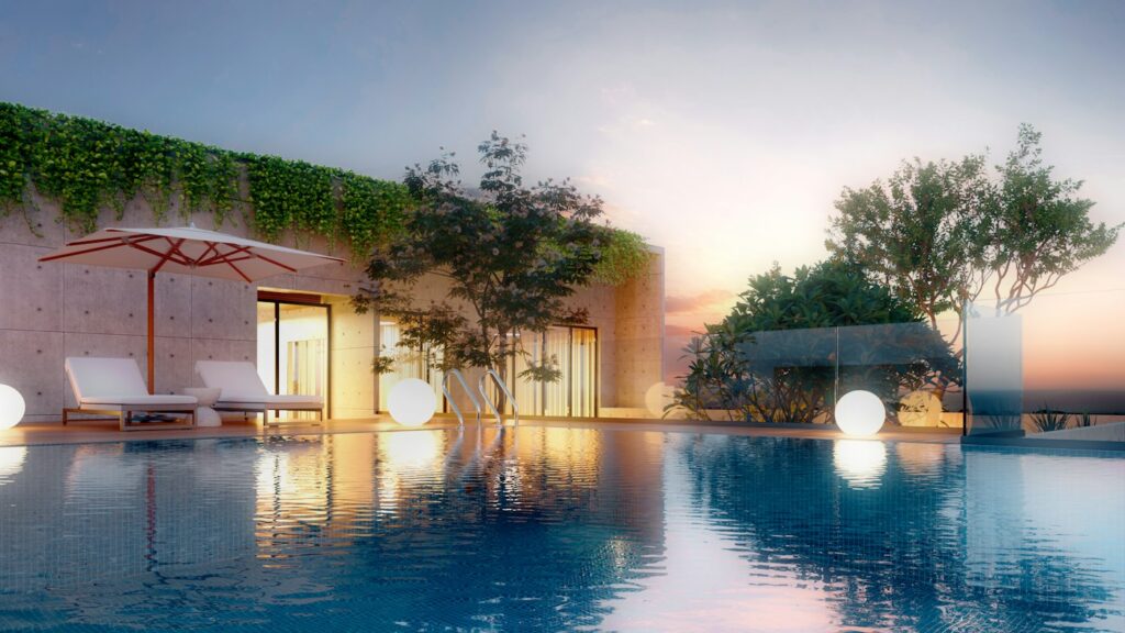 Rooftop terrace with lounge chairs at sunset